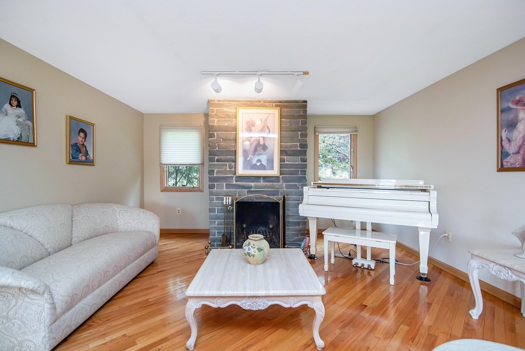 660 Ridge Road Wilbraham, MA 01095 - Photo 4 of 31 a living room with furniture fireplace and window