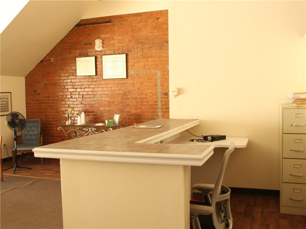 344-346 3rd Street California, PA 15419 - Photo 6 of 21 a room with a table chairs and wooden floor