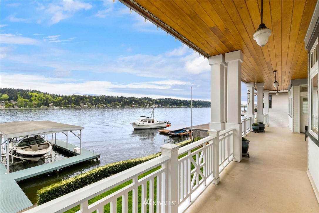6625 Ripley Ln S East Renton, WA 98056 - Photo 8 of 39 a view of a balcony with chairs and wooden floor