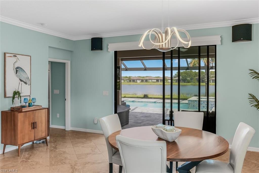 19862 Bittersweet Lane Estero, FL 33928 - Photo 15 of 50 a view of a dining room with furniture window and outside view