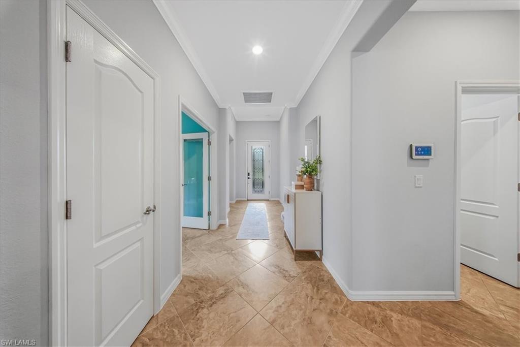 19862 Bittersweet Lane Estero, FL 33928 - Photo 27 of 50 a view of a hallway with living room
