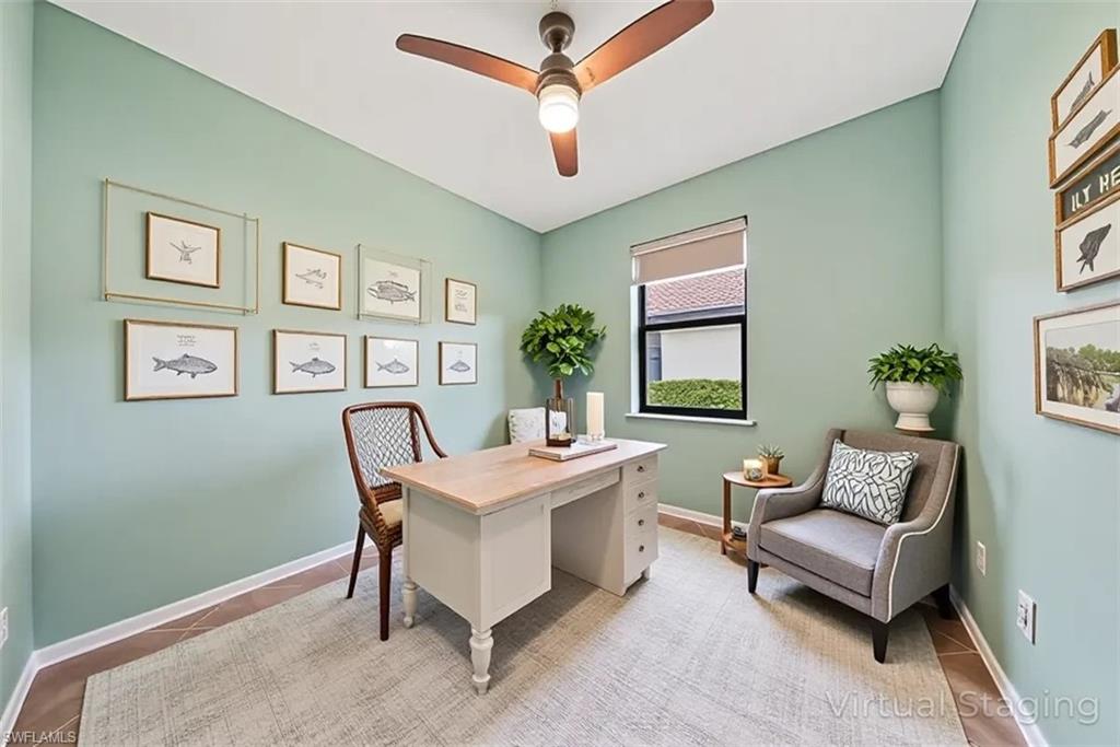 19862 Bittersweet Lane Estero, FL 33928 - Photo 28 of 50 a living room with furniture and a window