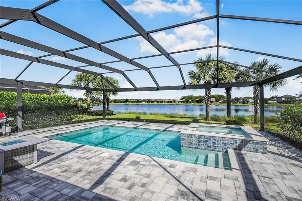19862 Bittersweet Lane Estero, FL 33928 - Photo 3 of 50 a view of a swimming pool with a porch