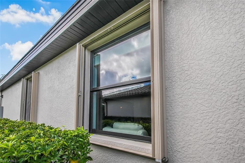 19862 Bittersweet Lane Estero, FL 33928 - Photo 31 of 50 Attached Hurricane Shutters