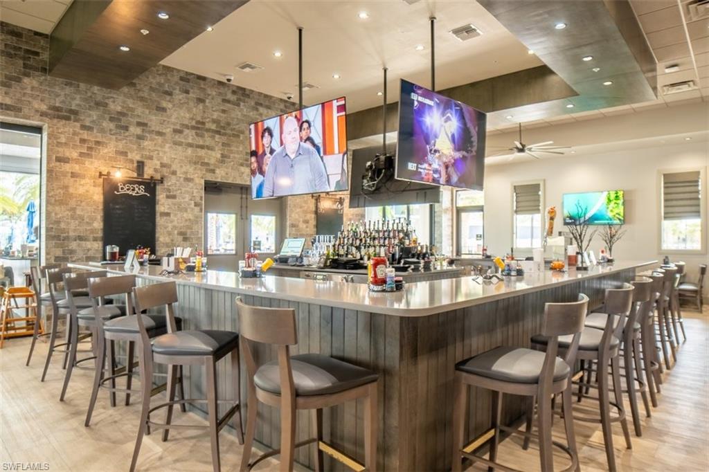 19862 Bittersweet Lane Estero, FL 33928 - Photo 41 of 50 a kitchen with lots of counter space furniture and appliances