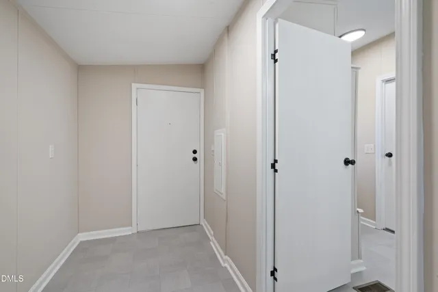 a view of a hallway with closet area