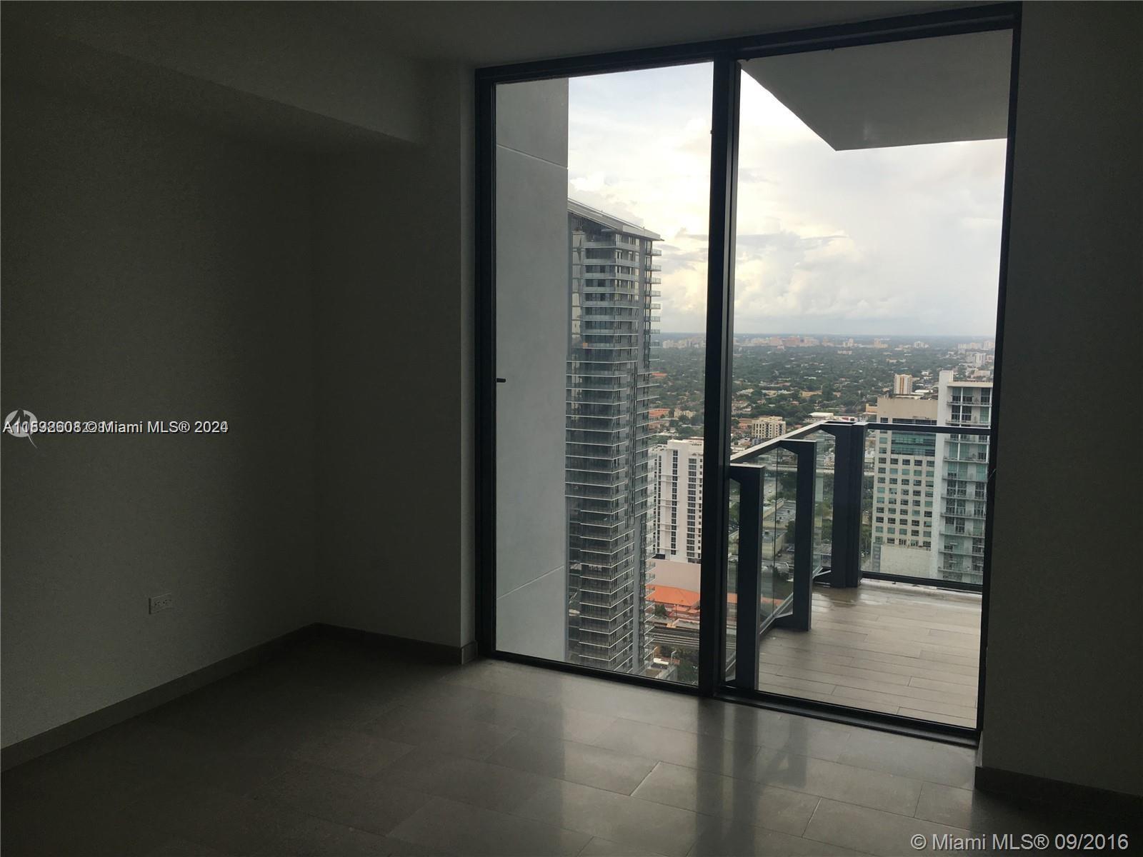 68 Southeast 6th Street, Unit 3510 Miami, FL 33131 - Photo 6 of 20 a view of a city from a window