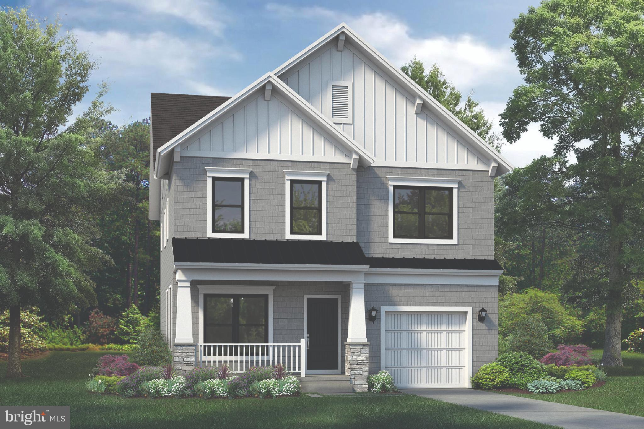 51 Edison Road Cherry Hill, NJ 08034 - Photo 1 of 22 a view of a yard in front of a house with plants and large tree