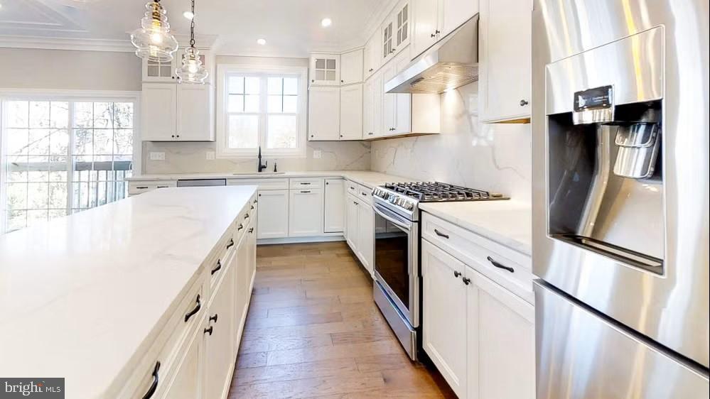 51 Edison Road Cherry Hill, NJ 08034 - Photo 15 of 22 a kitchen with stainless steel appliances granite countertop a sink a stove and a refrigerator