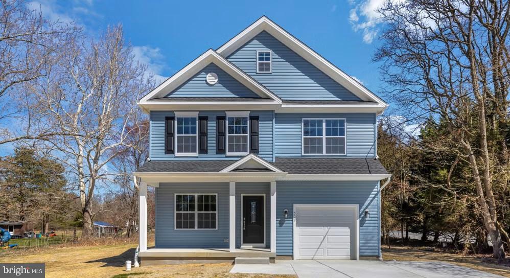 51 Edison Road Cherry Hill, NJ 08034 - Photo 2 of 22 a front view of a house with a tree