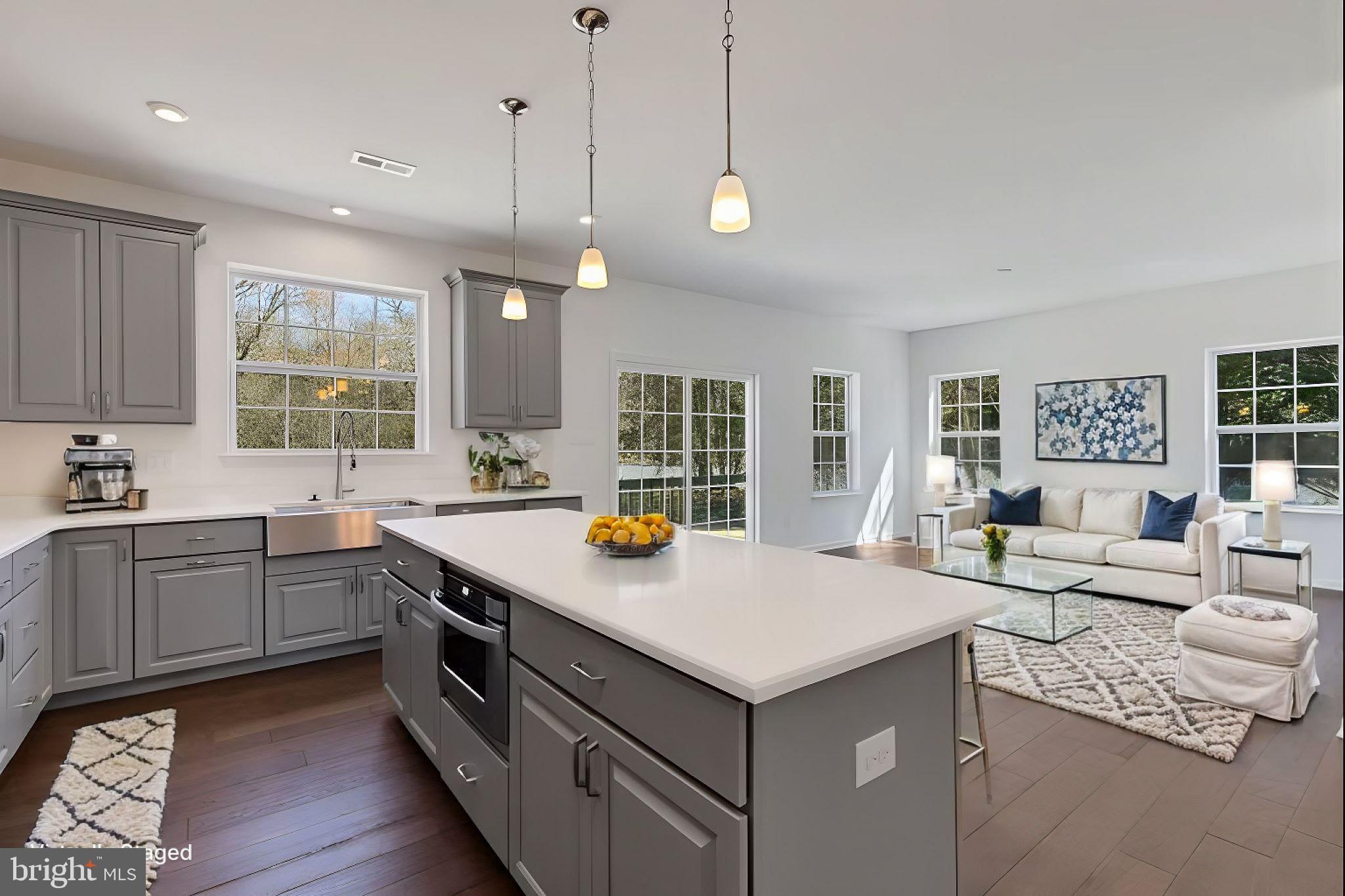 51 Edison Road Cherry Hill, NJ 08034 - Photo 8 of 22 a kitchen with a stove a sink and living room view