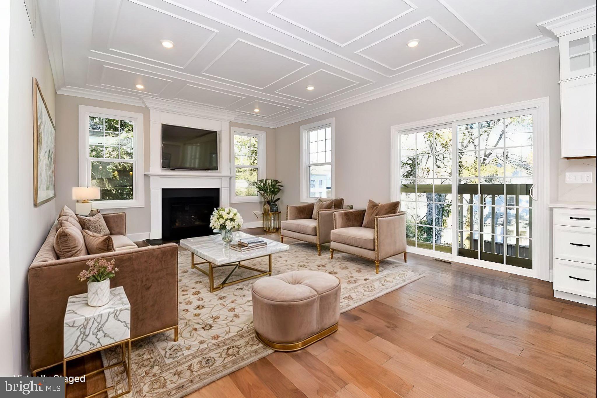 51 Edison Road Cherry Hill, NJ 08034 - Photo 9 of 22 a living room with furniture fireplace and a large window