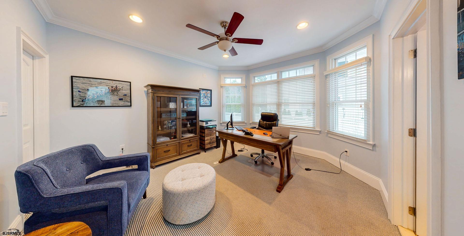 53 Bay Road Ocean City, NJ 08226 - Photo 19 of 68 a living room with furniture and a large window