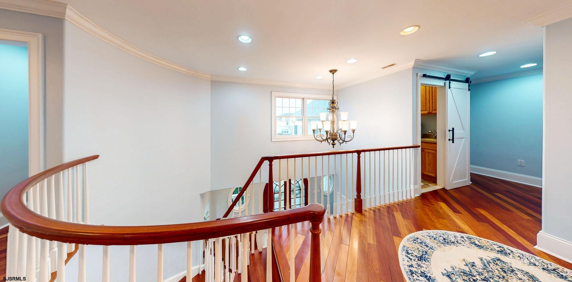 53 Bay Road Ocean City, NJ 08226 - Photo 22 of 68 a view of an entryway with wooden floor