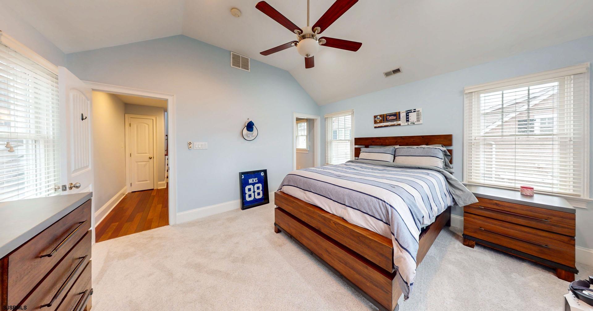 53 Bay Road Ocean City, NJ 08226 - Photo 24 of 68 a bedroom with a bed and a large window
