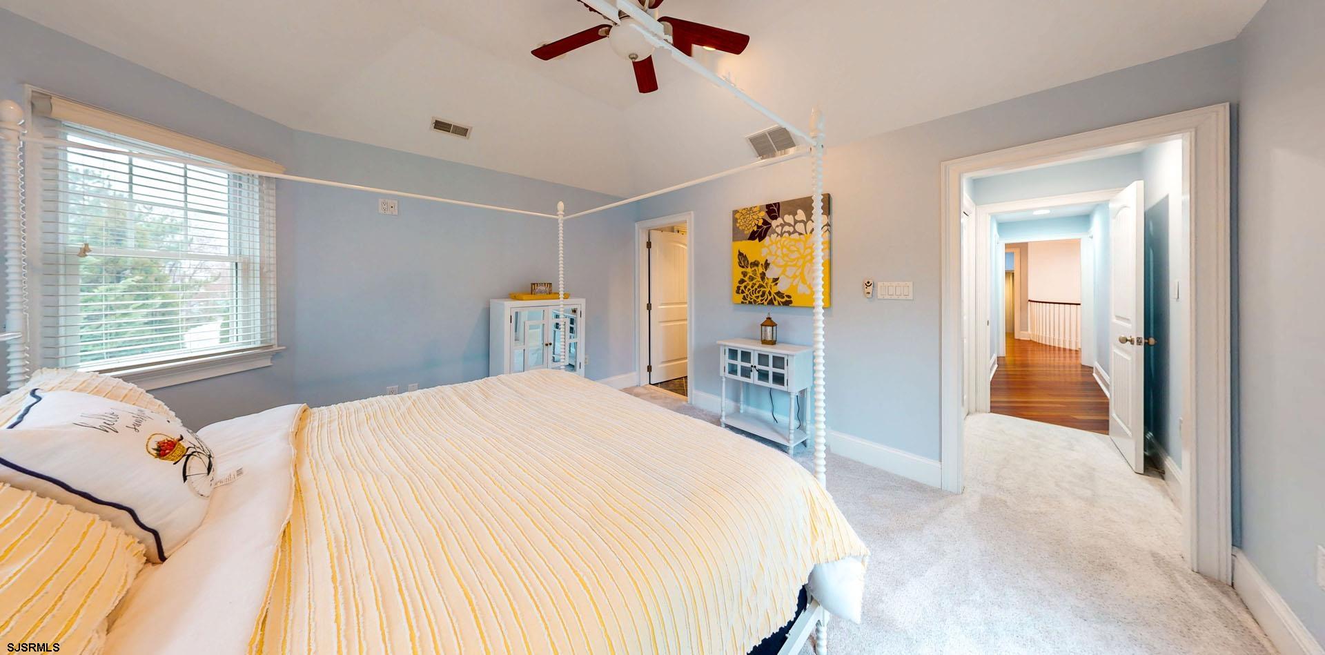 53 Bay Road Ocean City, NJ 08226 - Photo 32 of 68 a bedroom with a bed and a dresser