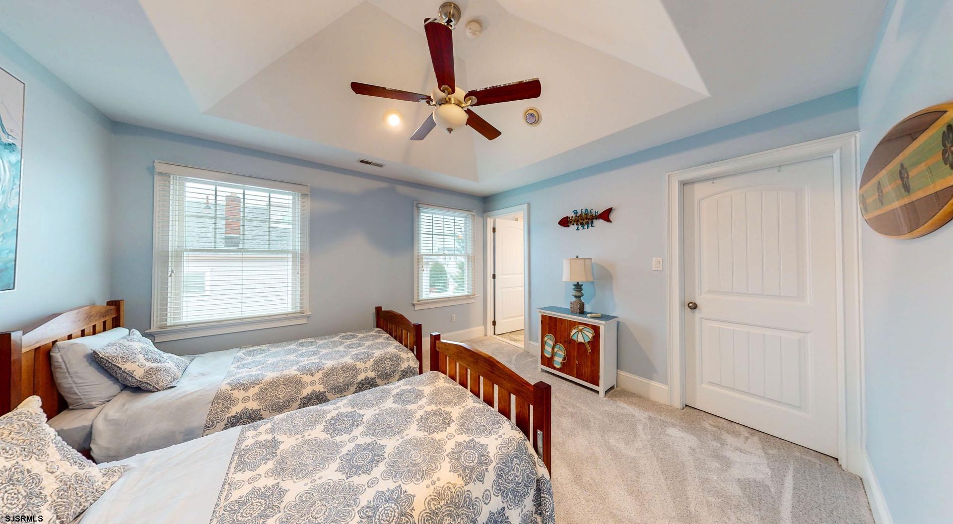 53 Bay Road Ocean City, NJ 08226 - Photo 46 of 68 a bedroom with furniture and a window