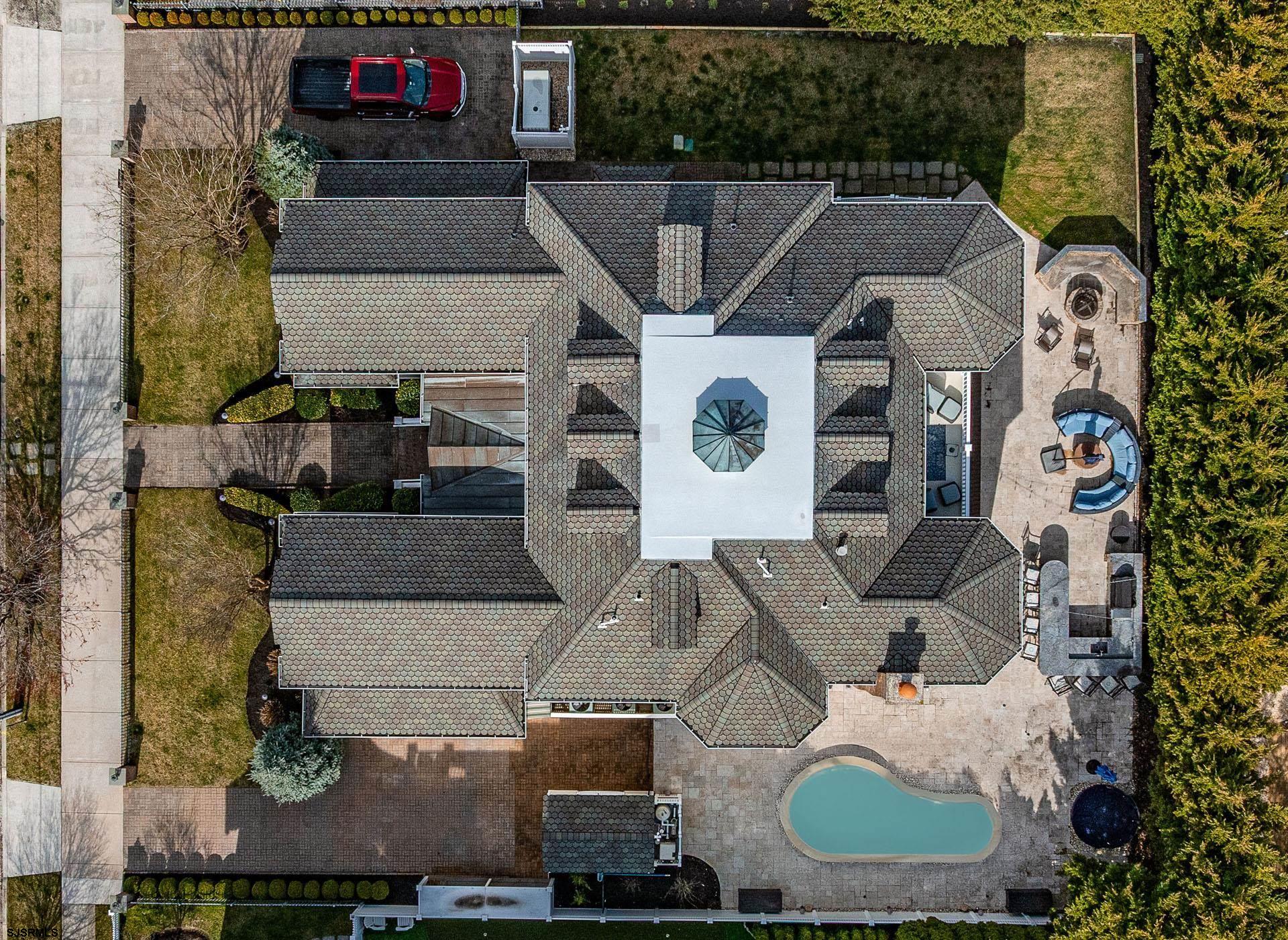 53 Bay Road Ocean City, NJ 08226 - Photo 68 of 68 an aerial view of a house with backyard space and seating area