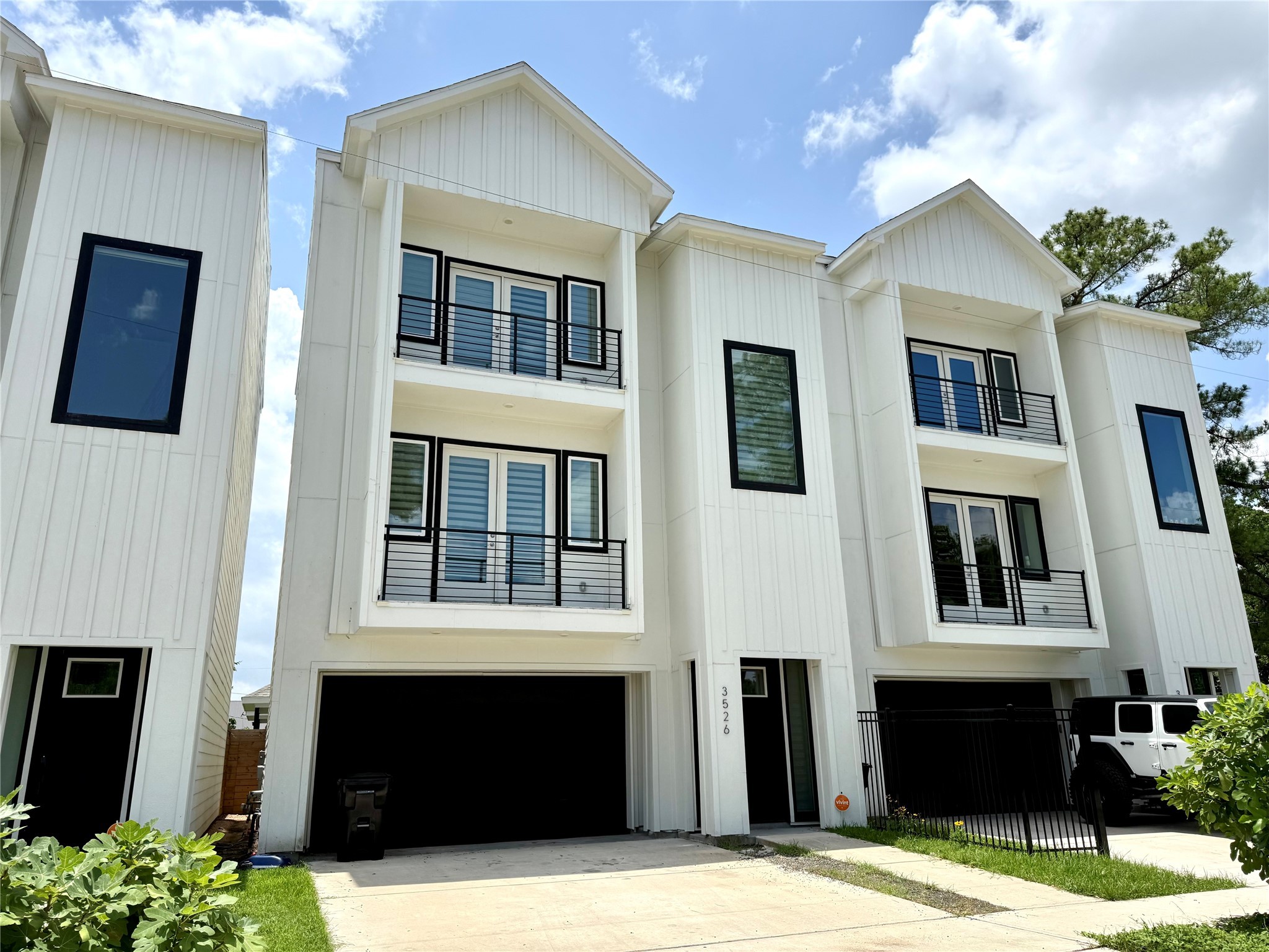 a front view of a house with yard