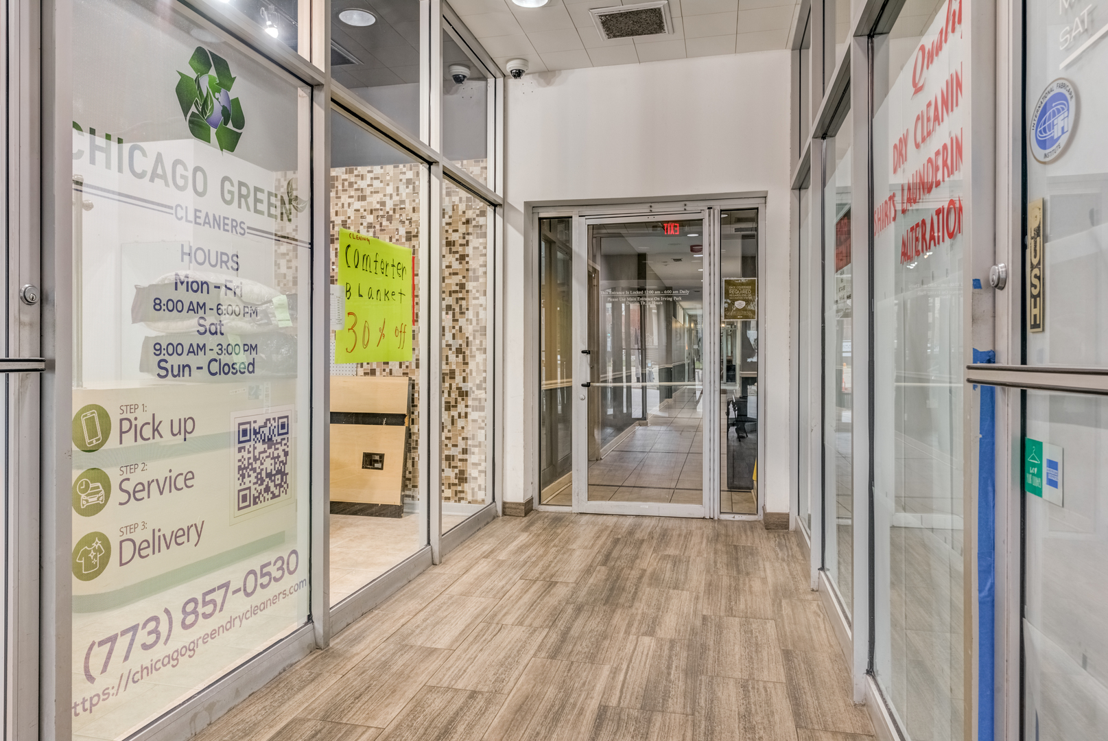 655 West Irving Park Road, Unit 5011 Chicago, IL 60613 - Photo 20 of 23 a view of an entryway with wooden floor