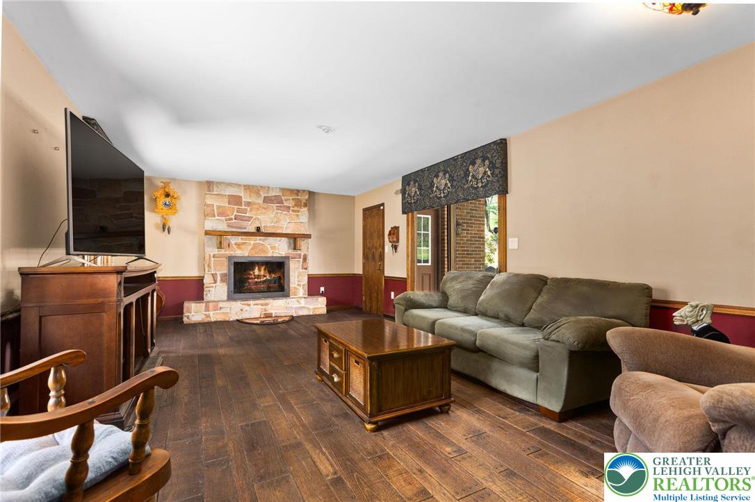 79 Country Club Road Ashland, PA 17921 - Photo 17 of 47 a living room with furniture and a flat screen tv