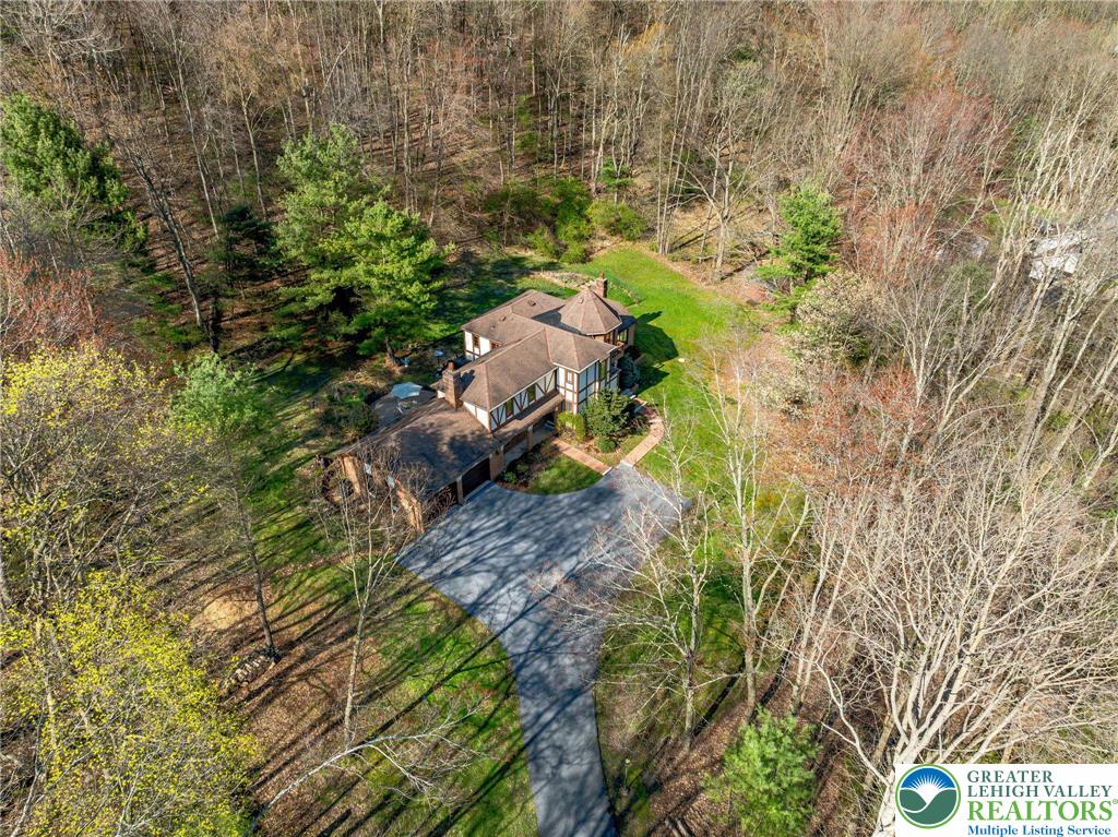 79 Country Club Road Ashland, PA 17921 - Photo 45 of 47 a backyard of a house with a yard and outdoor seating
