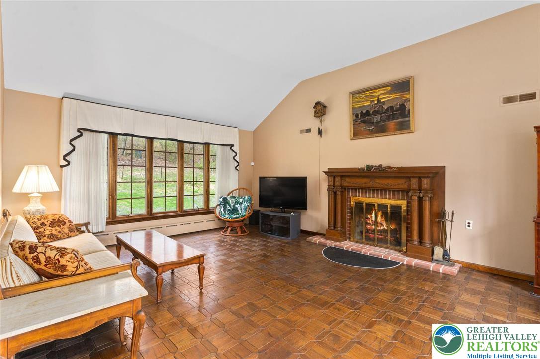 79 Country Club Road Ashland, PA 17921 - Photo 8 of 47 a living room with furniture a window and a fireplace