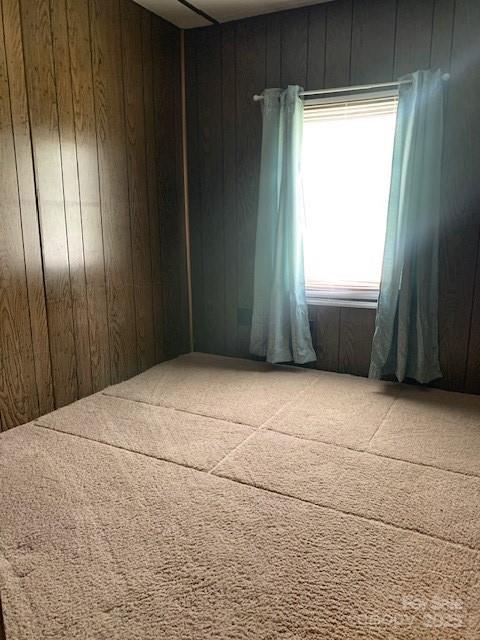 545 Bryson Branch Road Bryson City, NC 28713 - Photo 5 of 13 a view of an empty room with a window