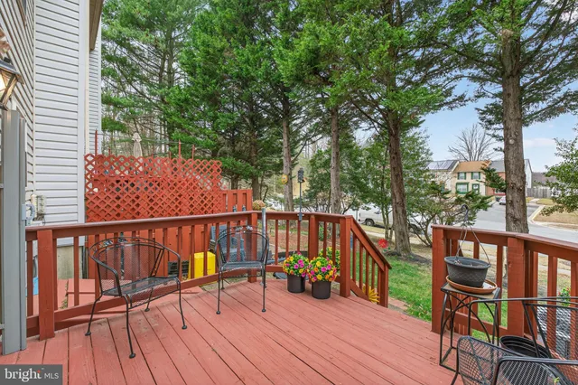 a view of balcony with deck and wooden floor