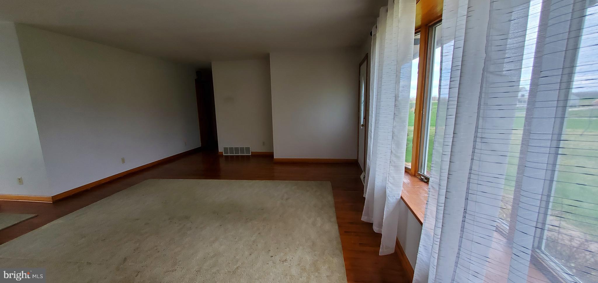 490 Pond Neck Road Earleville, MD 21919 - Photo 8 of 21 LIVING ROOM HALL TO BEDROOMS