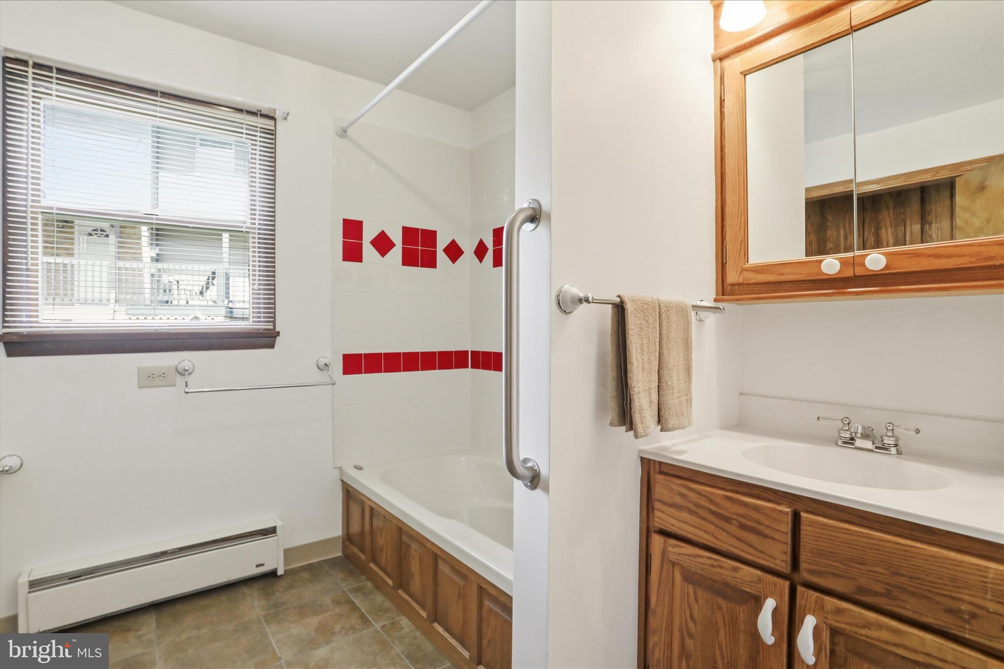 12623 Windy Ridge Drive Mount Savage, MD 21545 - Photo 16 of 72 a utility room with a sink dryer and washer