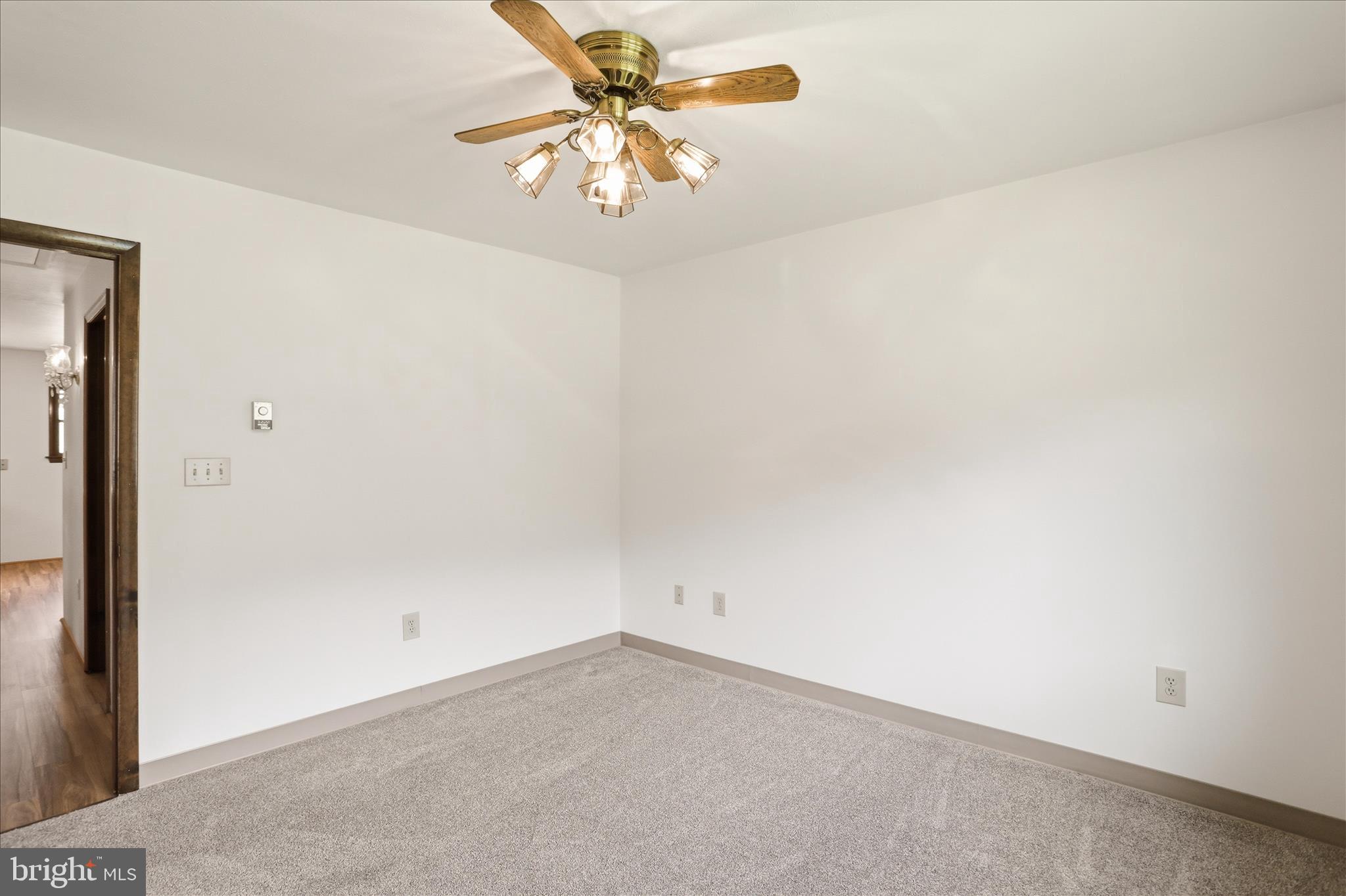 12623 Windy Ridge Drive Mount Savage, MD 21545 - Photo 20 of 72 an empty room with a fan and a window
