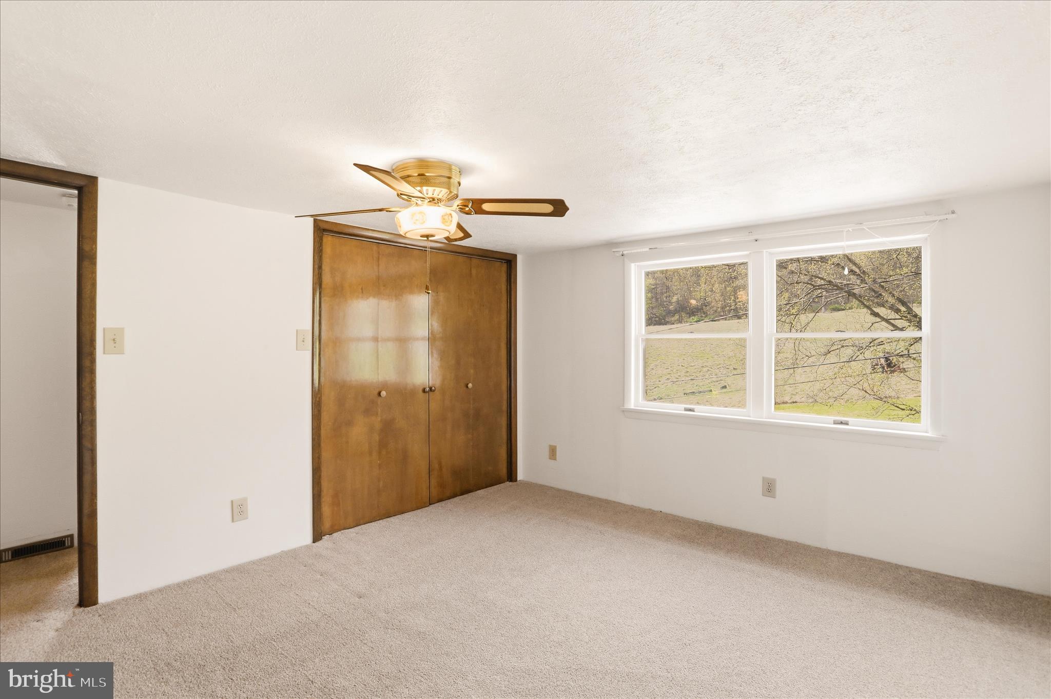 12623 Windy Ridge Drive Mount Savage, MD 21545 - Photo 39 of 72 a view of an empty room with a window