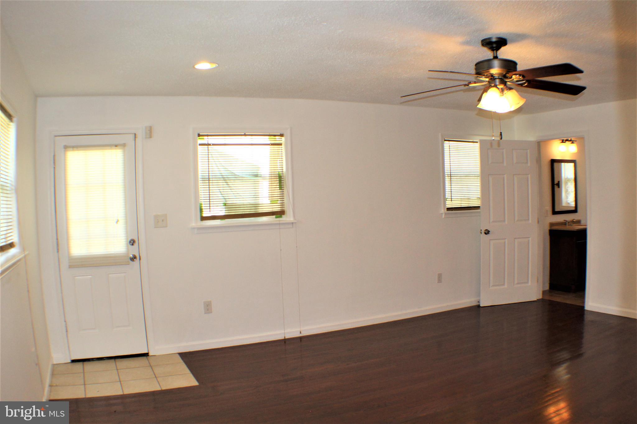 6418 Dogwood Road Baltimore, MD 21207 - Photo 13 of 33 Master Bedroom Main Level w/ view of Master Bath
