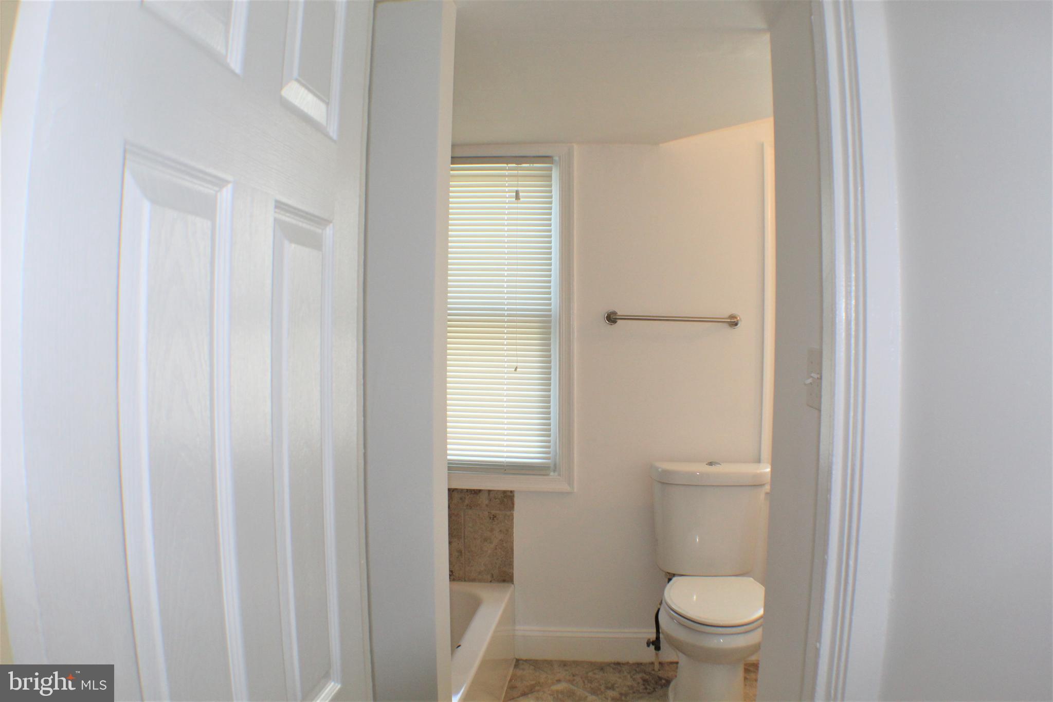 6418 Dogwood Road Baltimore, MD 21207 - Photo 25 of 33 Hall Bathroom 2nd Level
