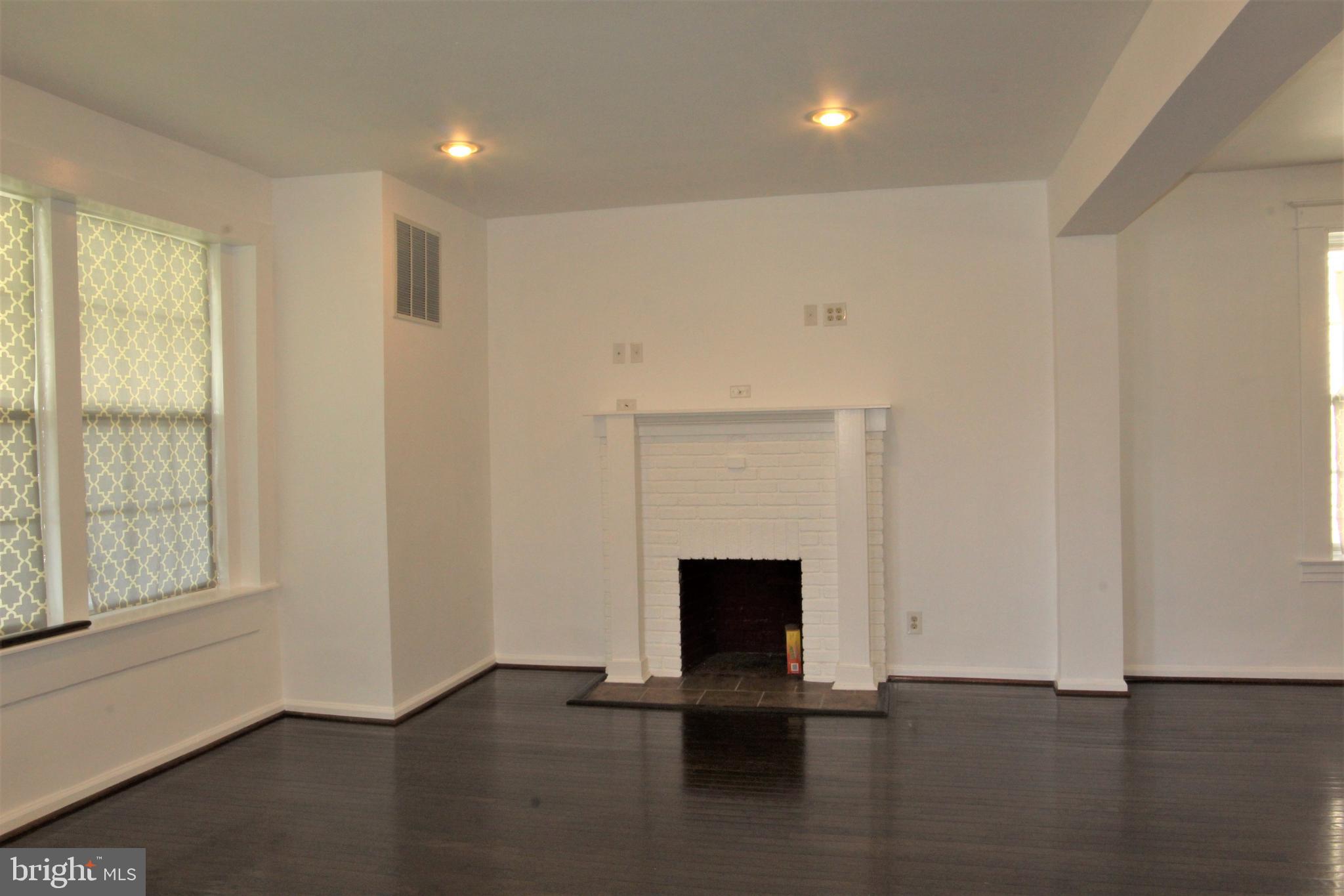 6418 Dogwood Road Baltimore, MD 21207 - Photo 4 of 33 Living Room w/ view of Fireplace