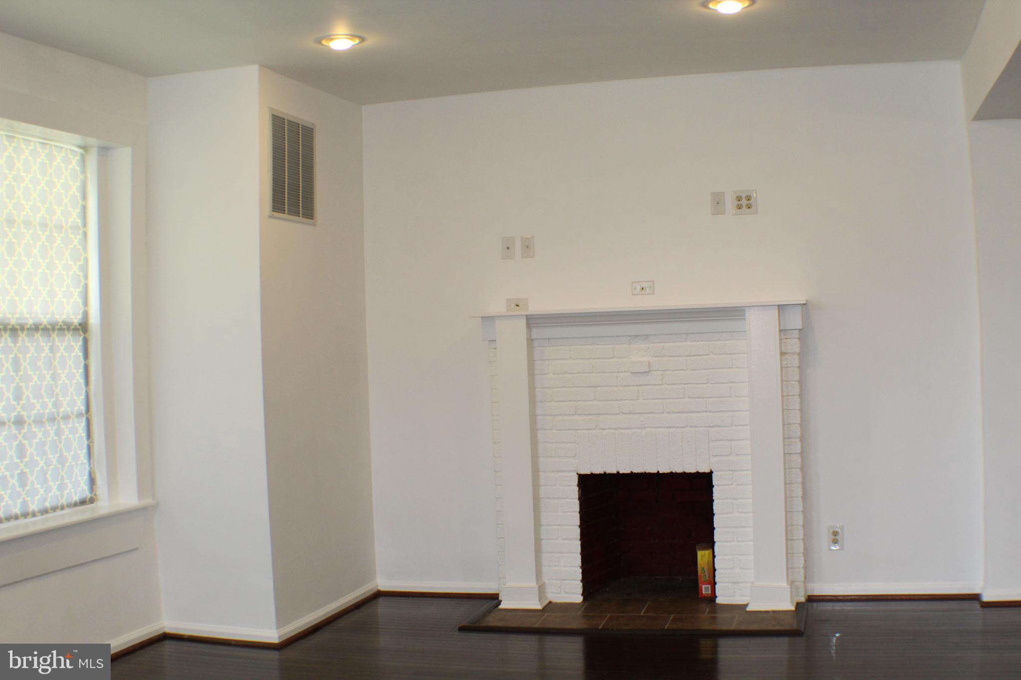 6418 Dogwood Road Baltimore, MD 21207 - Photo 5 of 33 View of Fireplace in Living Room