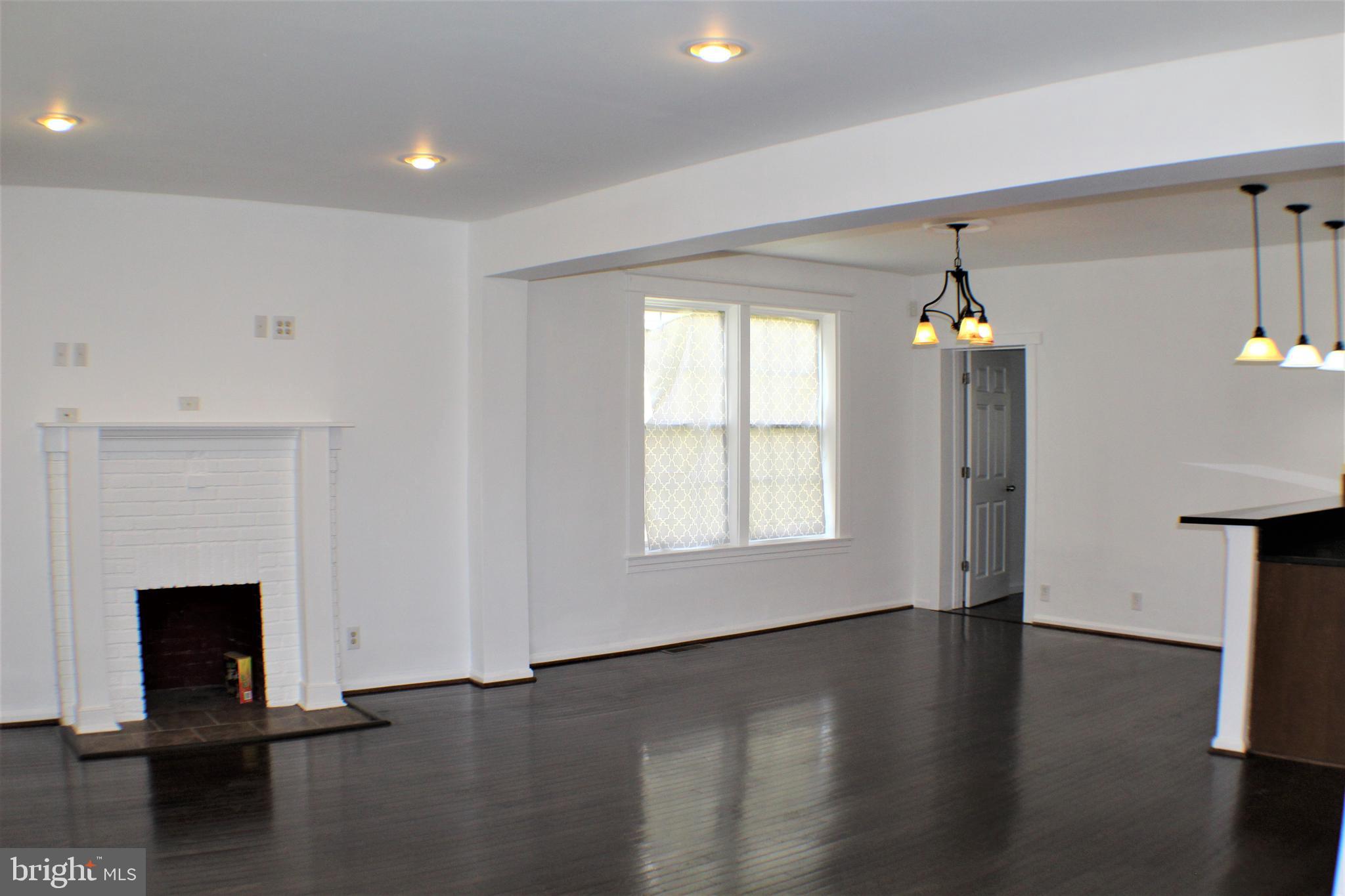 6418 Dogwood Road Baltimore, MD 21207 - Photo 6 of 33 View of Living Room and Dining Room