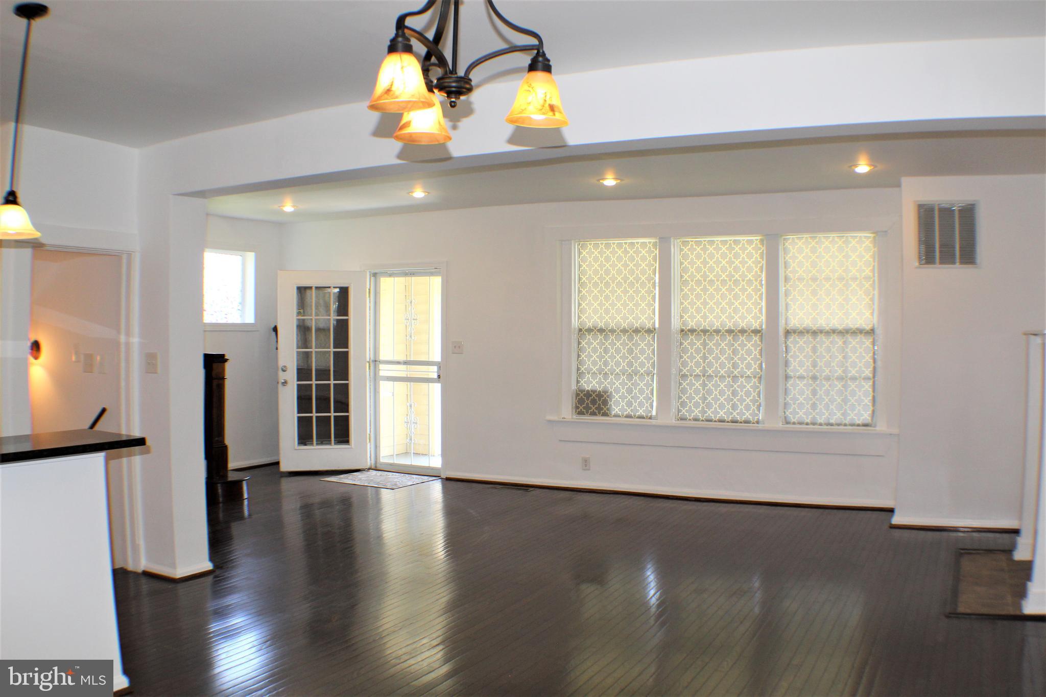6418 Dogwood Road Baltimore, MD 21207 - Photo 7 of 33 Living room and Foyer
