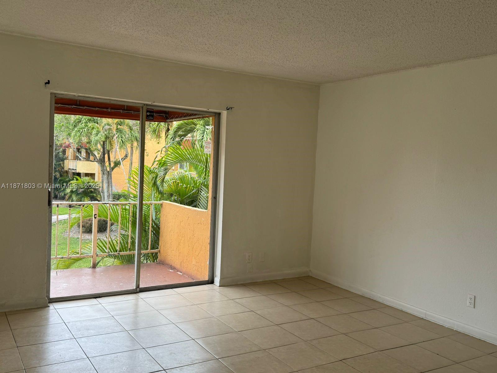 17901 Northwest 68th Avenue, Unit T203 Hialeah, FL 33015 - Photo 2 of 15