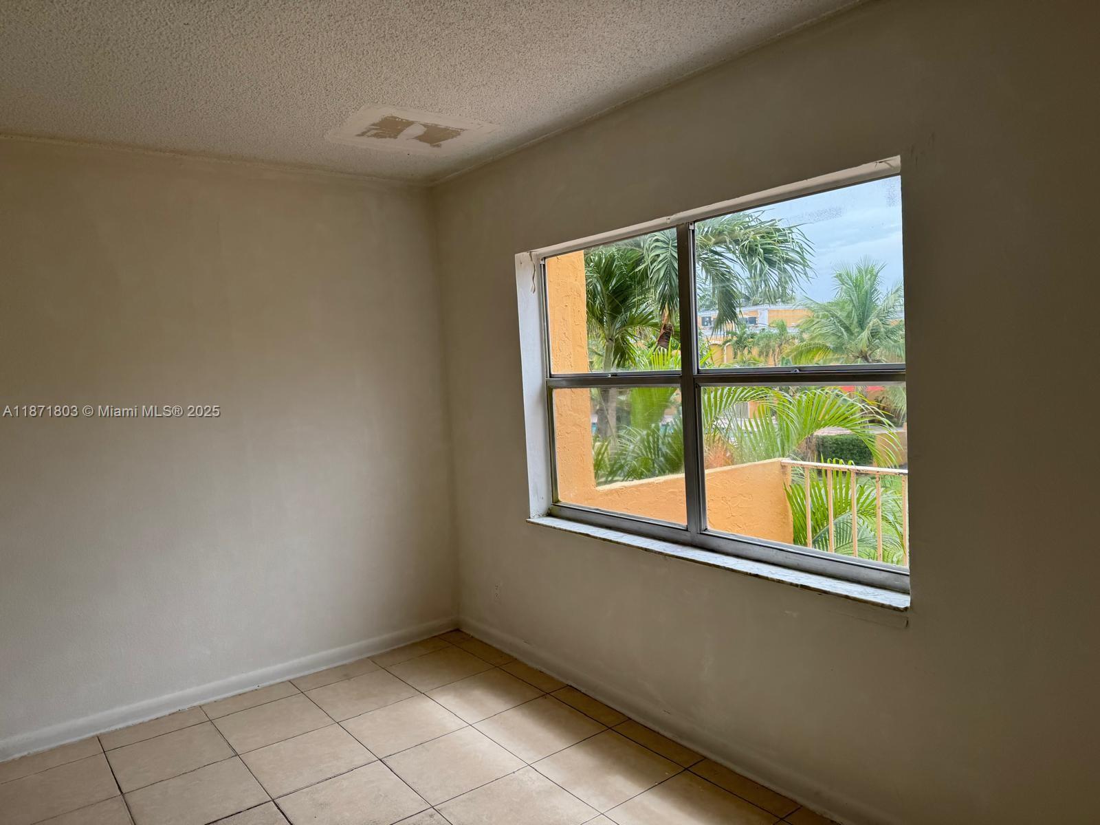 17901 Northwest 68th Avenue, Unit T203 Hialeah, FL 33015 - Photo 6 of 15