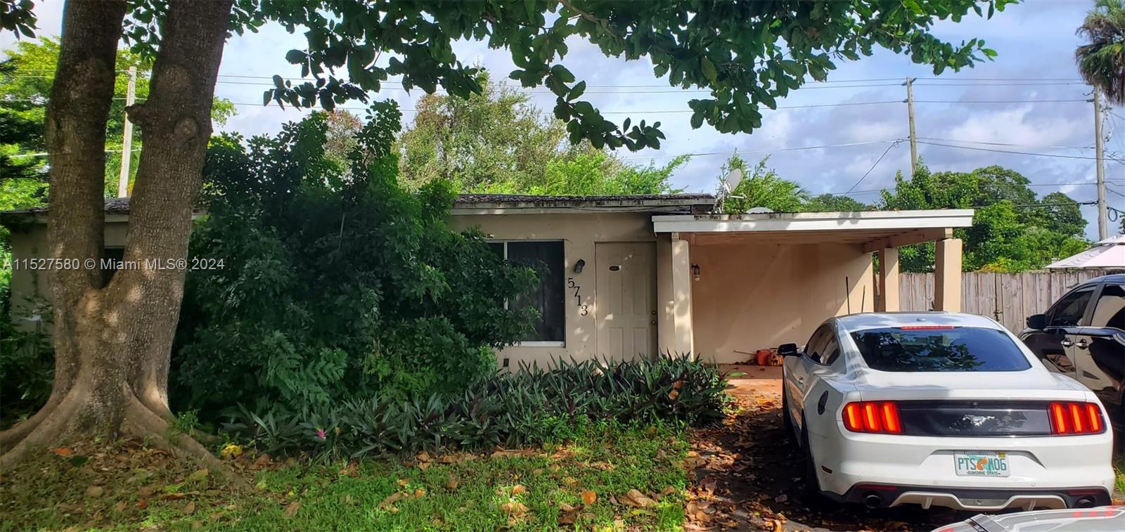 5713 Seton Drive Margate, FL 33063 - Photo 1 of 17 a house view with a garden space