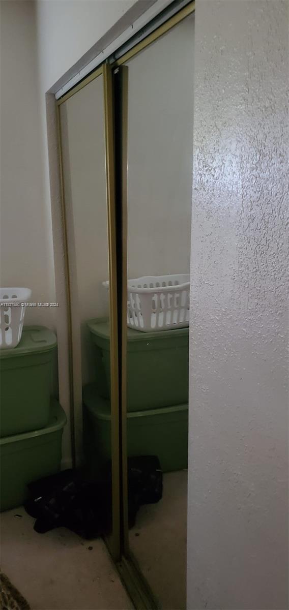 5713 Seton Drive Margate, FL 33063 - Photo 3 of 17 a bathroom with a mirror