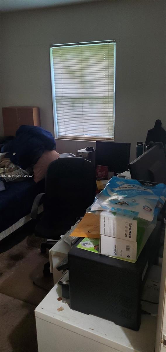 5713 Seton Drive Margate, FL 33063 - Photo 4 of 17 a kitchen with a stove and a window