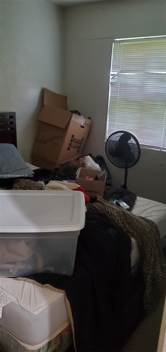 5713 Seton Drive Margate, FL 33063 - Photo 7 of 17 a bathroom with a toilet and a mirror