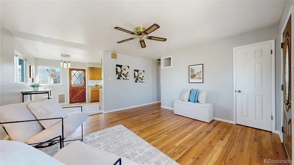 a bedroom with a bed and glass door