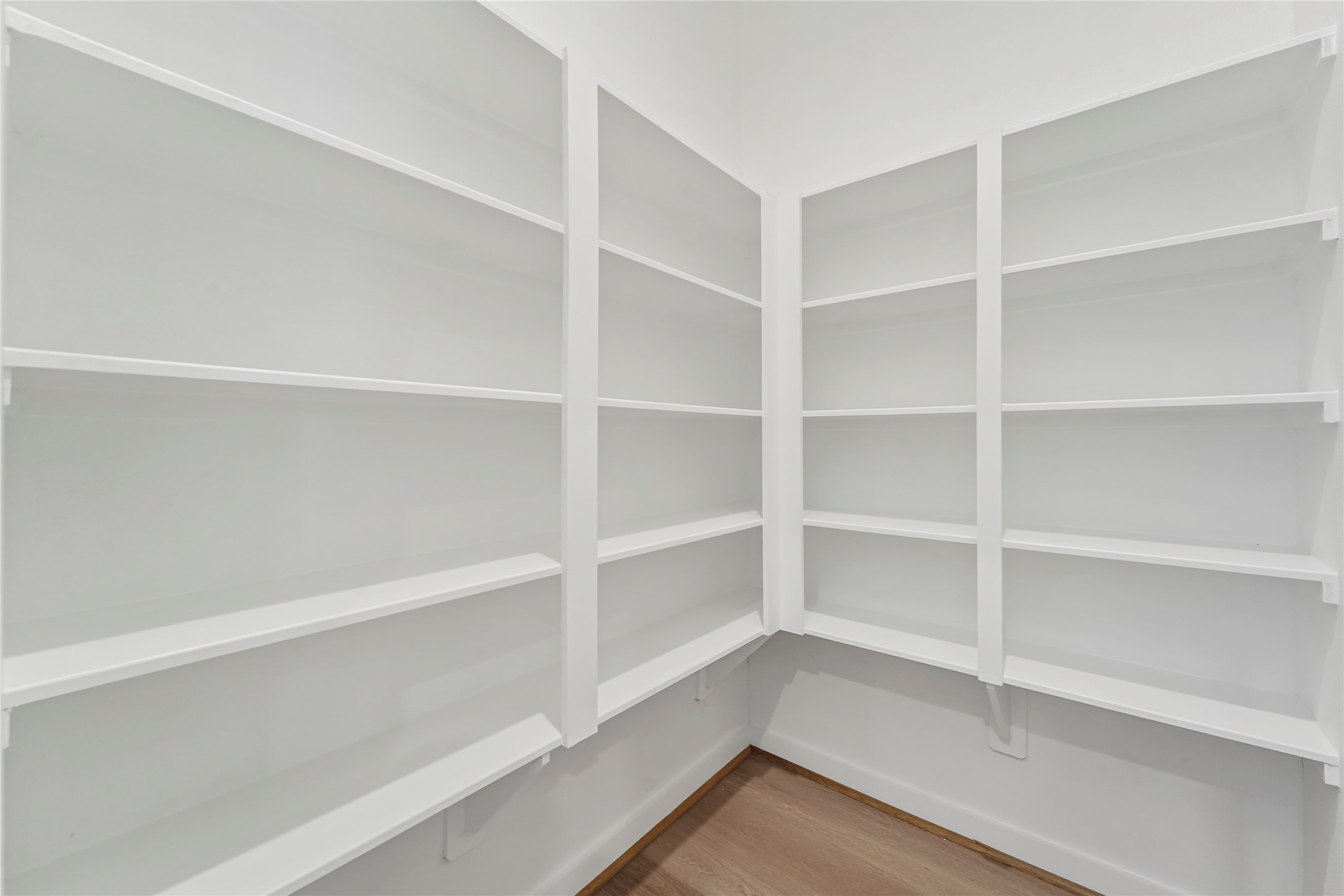1013 Erin Street, Unit V Houston, TX 77009 - Photo 7 of 25 a view of walk in closet with empty racks