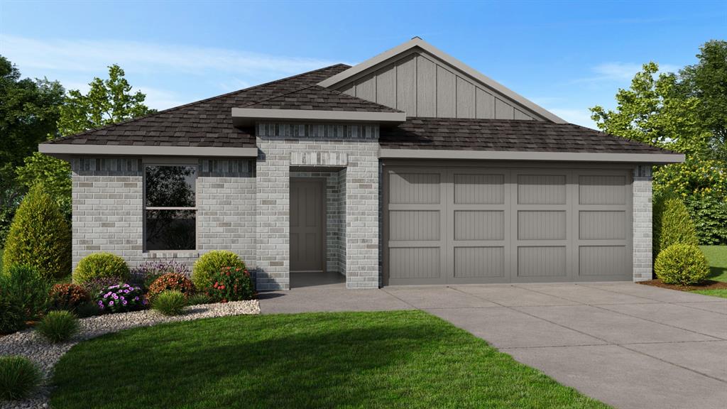 10909 Lone Ranger Lane Crowley, TX 76036 - Photo 2 of 3 a front view of a house with a garden
