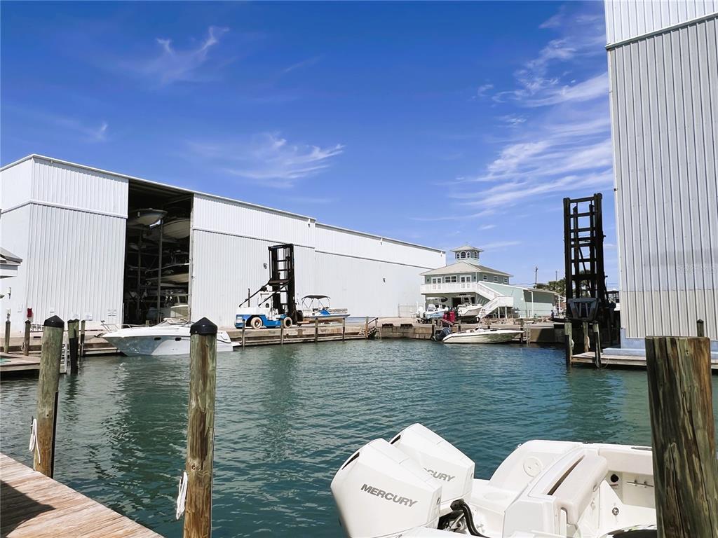 100 Circuit Road, Unit S12 Nokomis, FL 34275 - Photo 13 of 16 a view of swimming pool with outdoor seating and yard
