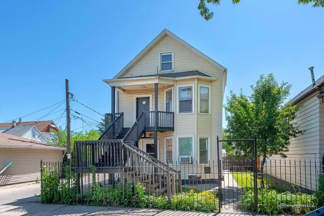 a front view of a house with balcony